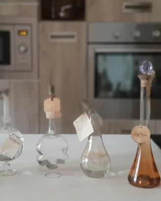 8 Bottigline di Grappa in vetro soffiato Vintage