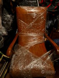 Sedia a dondolo di pelle