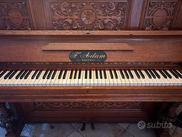 Pianoforte a muro in legno con intarsi “F Adam”