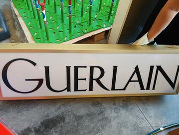 Insegna luminosa bifacciale Guerlain