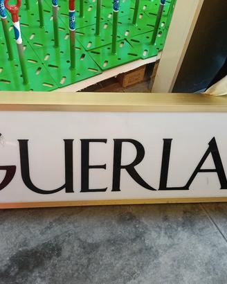 Insegna luminosa bifacciale Guerlain