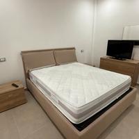 Camera da letto con trittico