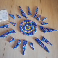 Creazione artistica sole in ceramica dipinta