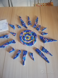 Creazione artistica sole in ceramica dipinta