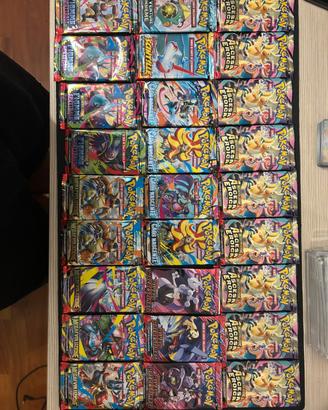 Lotto 27 pacchetti carte pokemon ita