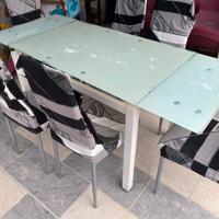 Tavolo in vetro temperato + 6 sedie ecopelle bianc