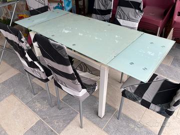 Tavolo in vetro temperato + 6 sedie ecopelle bianc