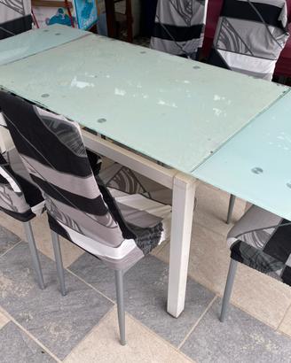 Tavolo in vetro temperato + 6 sedie ecopelle bianc