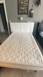 Letto ad una piazza e mezzo con testiera in legno