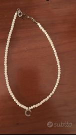 Collana di perla con iniziale “C”
