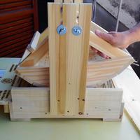 Piccola cardatrice manuale per la casa