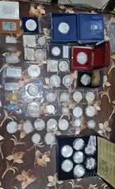 collezione di monete e lingotti in argento 999