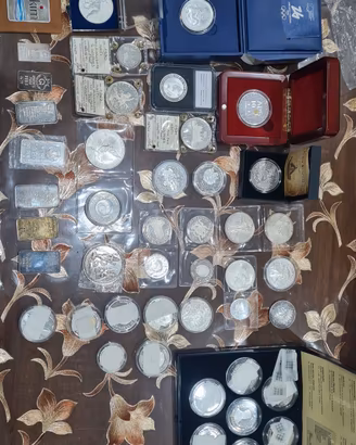 1,1kg collezione monete e lingotti in argento 999