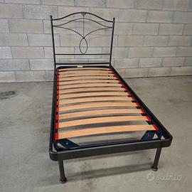 letto in ferro lavorato completo di rete e coprire