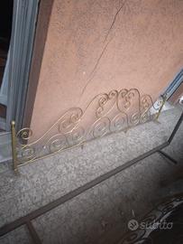 testata e rete di ferro battuto 