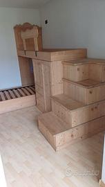 cameretta in legno con 2 posti letto