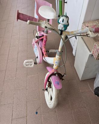 Bicicletta bambina winx 12" con portabambole