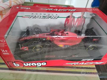 Modellino formula uno Leclerc e libro Ferrari