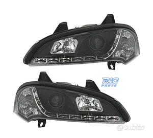 FARI PER OPEL TIGRA 95-03 LUCE DIURNA A LED FONDO 