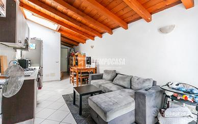 TRILOCALE MANSARDATO IN UNA PICCOLA PALAZZINA CON