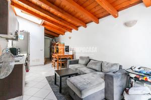 TRILOCALE MANSARDATO IN UNA PICCOLA PALAZZINA CON