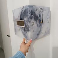 Orologio angolare bifacciale 