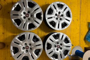 Cerchi in ferro originali Fiat Dobló 15” + coppe