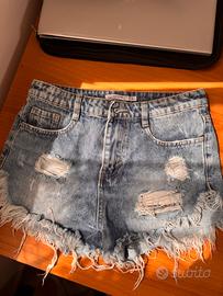 Shorts jeans strappati vita alta effetto vintage