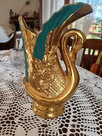 vaso dorato a forma di cigno