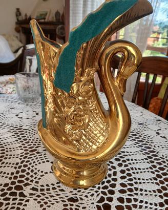 vaso dorato a forma di cigno