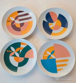 Set di 4 piatti da collez Brandani in porce dm 24