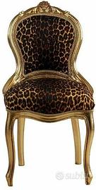 Sedia dorata tessuto leopardato