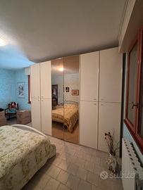 Armadio 6 ante con specchio centrale