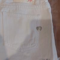 pantaloncini corti bianchi con frange