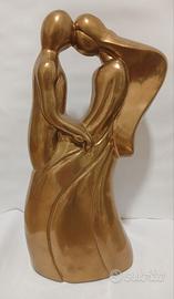 Simbiosi, scultura laccata oro