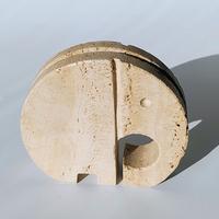 Elefante in travertino di  Enzo Mari per  Fratelli