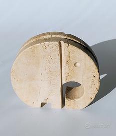 Elefante in travertino di  Enzo Mari per  Fratelli