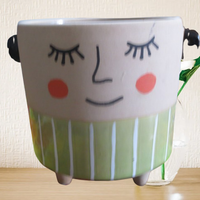 Vasetto Decorativo in Ceramica "Viso Sereno"