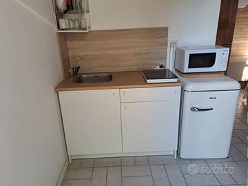 Camera con angolo cottura