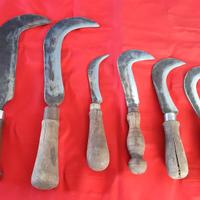 Roncole antiche con manico di legno
