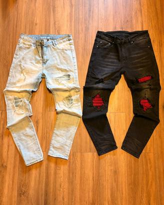 Jeans Amiri Slim Fit con strappi Neri e Azzurri