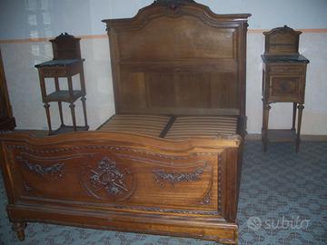 camera da letto in noce scolpita