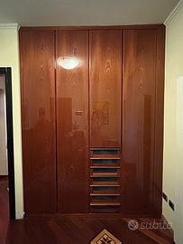 Armadio in legno (L205xP63xH276)