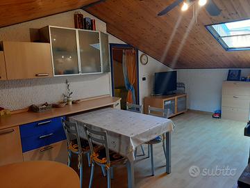 Appartamento mansardato con posto auto