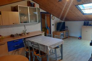 Appartamento mansardato con posto auto