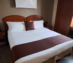 Runner e cuscini per letto matrimoniale