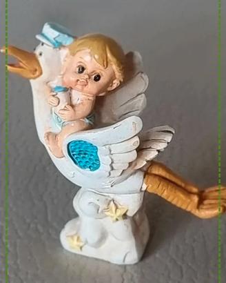 Bomboniera cicogna con bambino