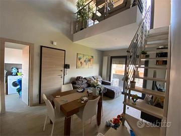 Attico con terrazzo a livello