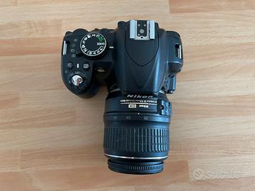 Nikon D3100 + Nikkor 18-55mm + Accessori
