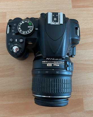 Nikon D3100 + Nikkor 18-55mm + Accessori